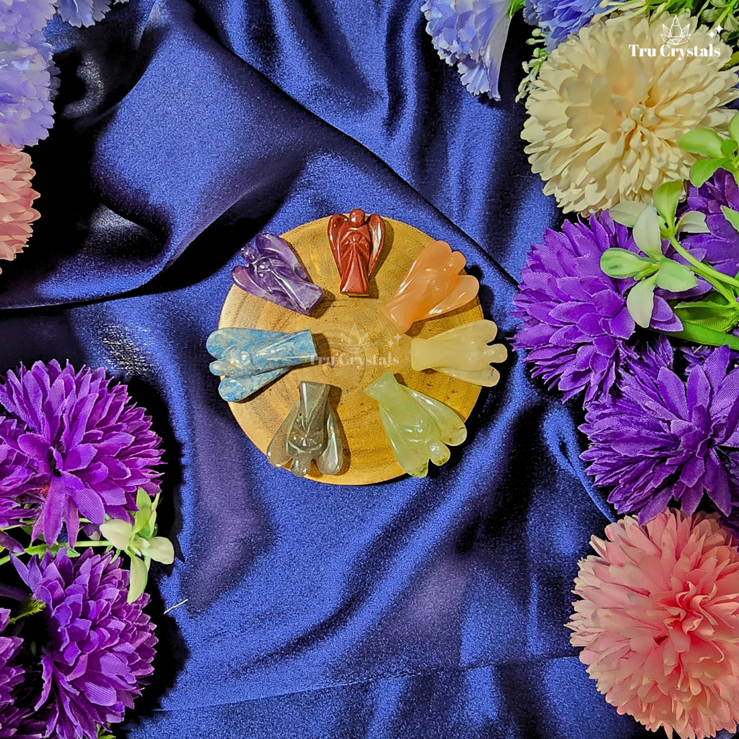 7 Chakra Crystal Angel Set with Red Jasper, Orange Aventurine, Yellow Aventurine, Green Aventurine, Lapis Lazuli, Iolite and Amethyst angels.