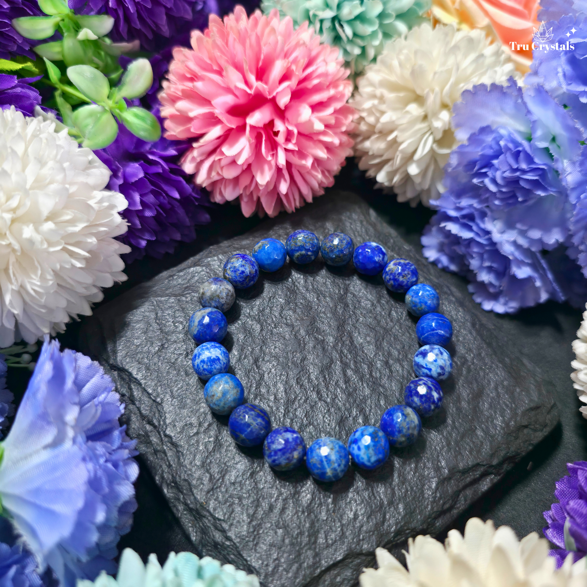 8mm faceted natural Lapis Lazuli crystal bracelet with royal-blue colour, natural white Calcite and golden-toned Pyrite inclusions for wisdom, intuition and confident communication by TruCrystals