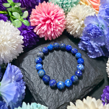 8mm faceted natural Lapis Lazuli crystal bracelet with royal-blue colour, natural white Calcite and golden-toned Pyrite inclusions for wisdom, intuition and confident communication by TruCrystals