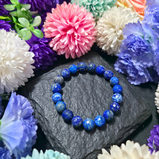 8mm faceted natural Lapis Lazuli crystal bracelet with royal-blue colour, natural white Calcite and golden-toned Pyrite inclusions for wisdom, intuition and confident communication by TruCrystals