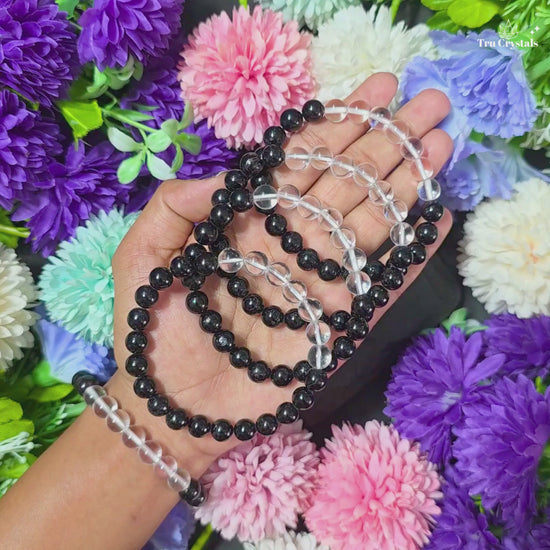 A multistone bracelet featuring black tourmaline and clear quartz.