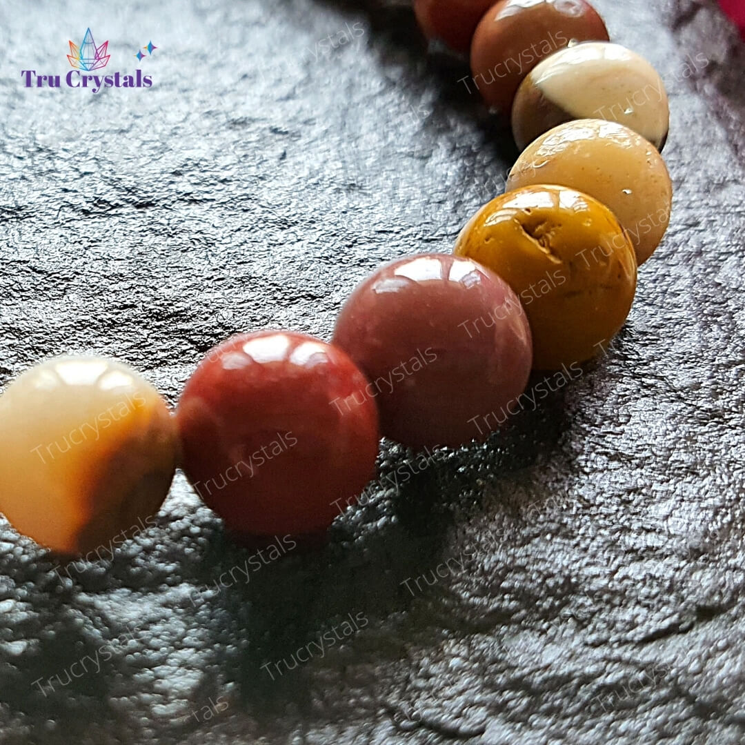 Young & Forever Diwali Gifts Brown Crystal Buddhist Yoga Reiki Healing Semi  Precious Stone Strengthen Courage Mookaite Jasper Om Charm Bracelet for  Women : Young & Forever: Amazon.in: Fashion