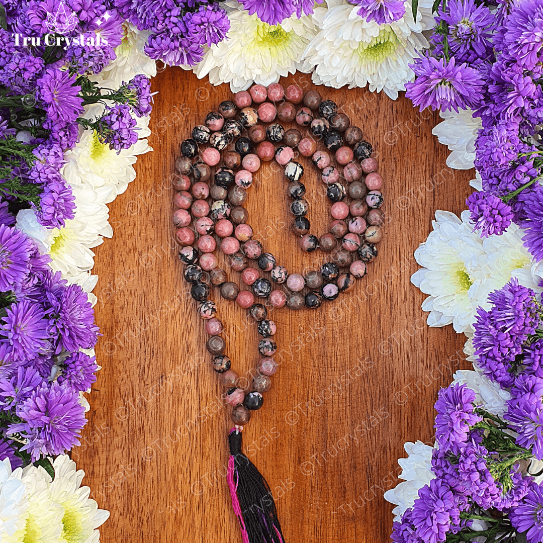 Rhodonite Crystal Japa mala: To achieve your Highest potential