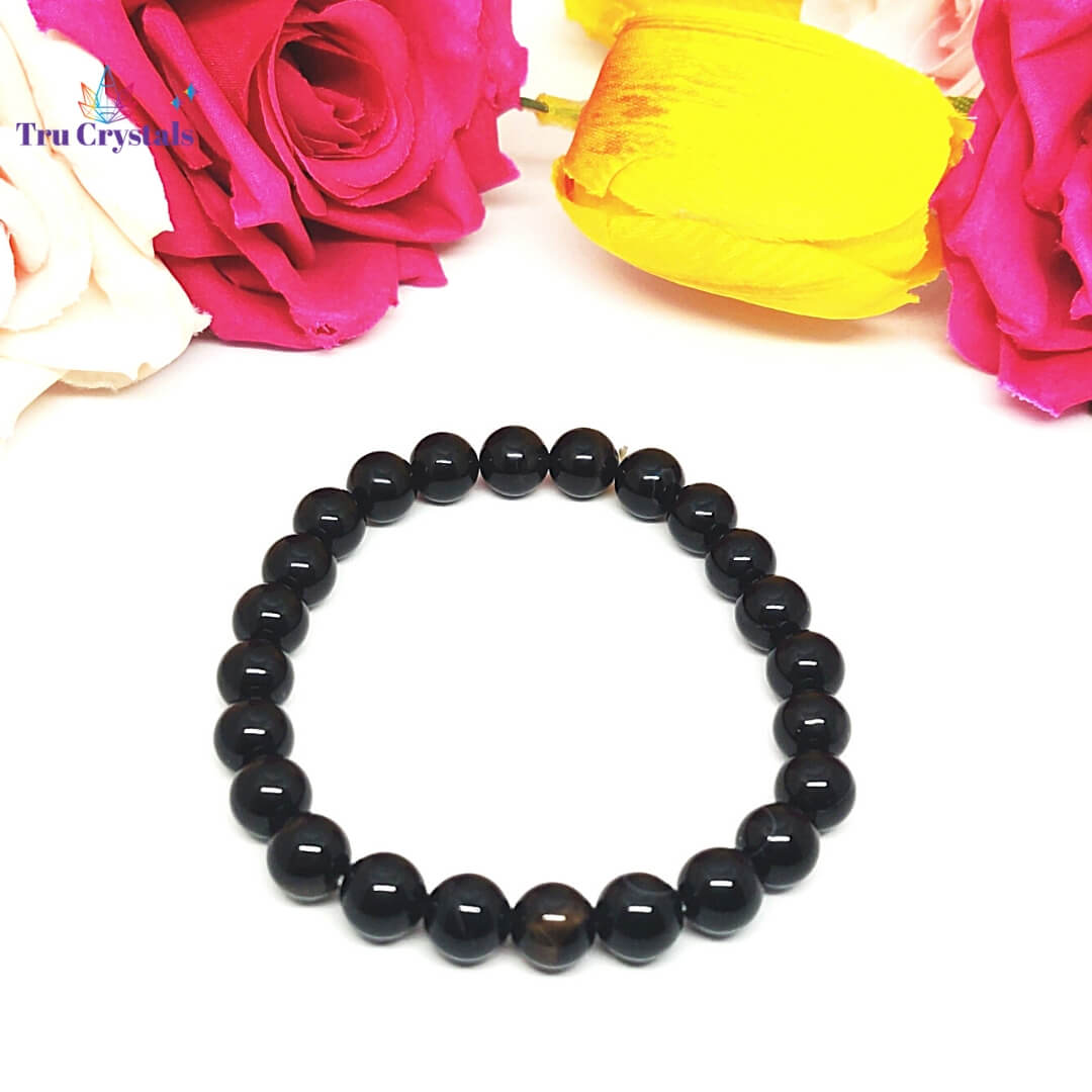 Buy Takshila Gems® Natural Black Obsidian Bracelet 8 mm Beads Lab Certified  Stretchable Elastic Bracelet, Obsidian Stone Bracelet at Amazon.in