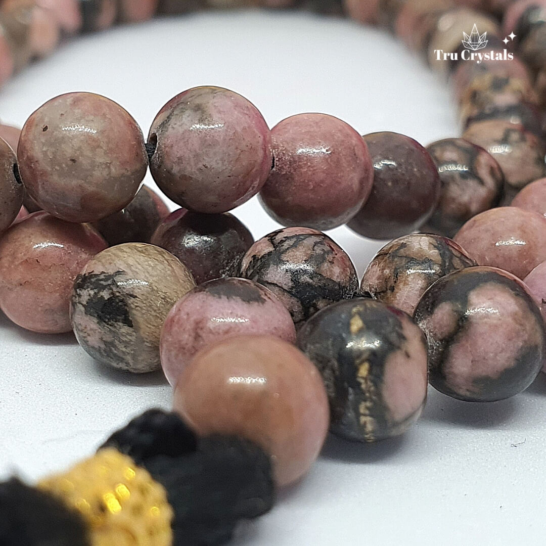 Rhodonite Crystal Japa mala: To achieve your Highest potential